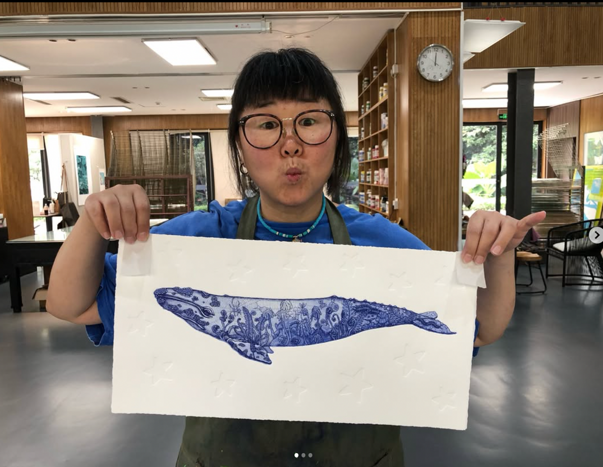 Kim HyunJu holding her finishing print
